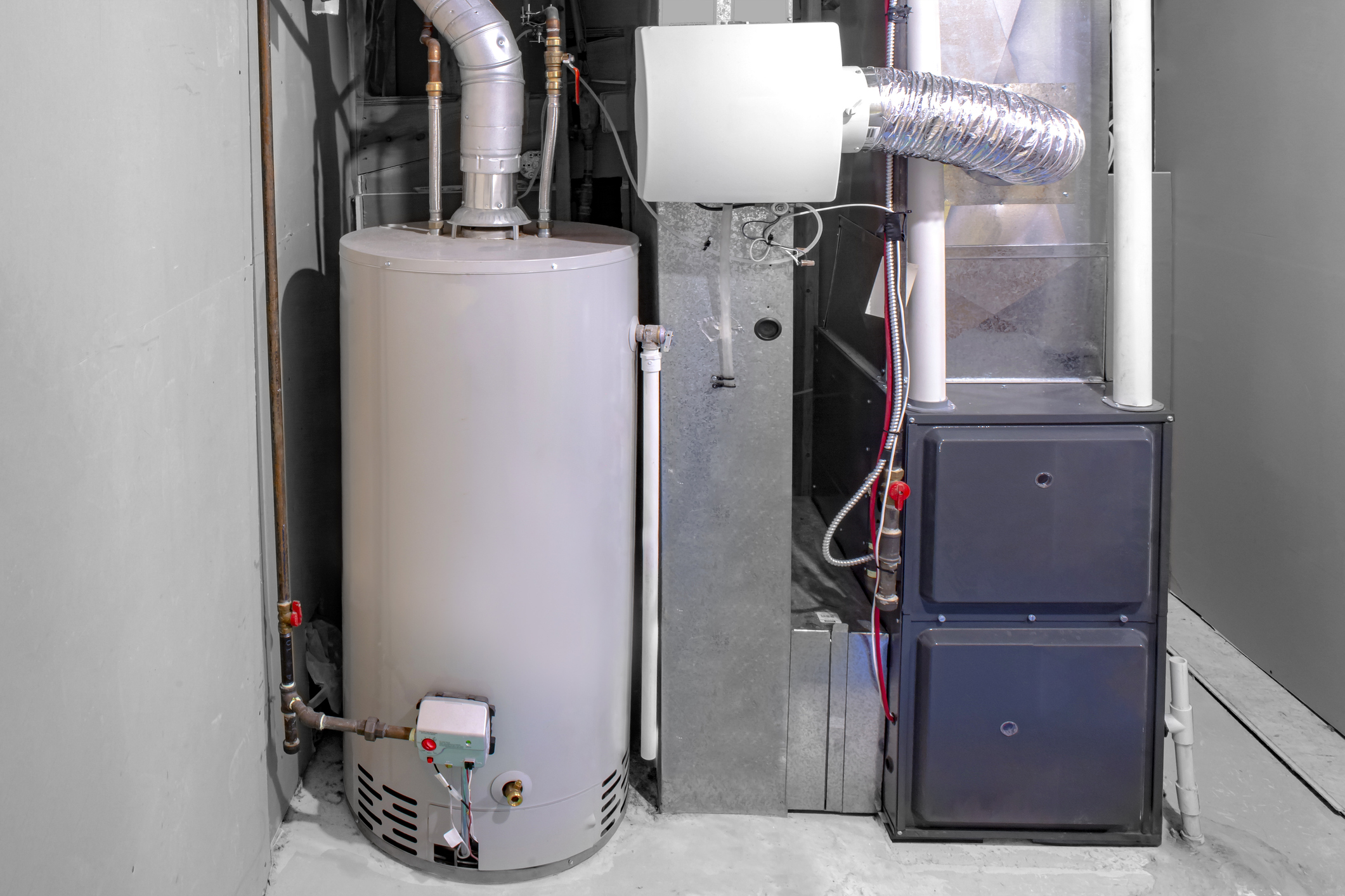 Gas furnace and water heater installed in the basement of a home